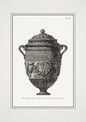 Decorative urn with intricate designs on a white background