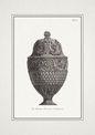 Decorative urn with intricate patterns on a white background