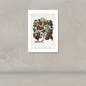 A vintage botanical art print of a tomato plant with red tomatoes and green leaves, mounted on a textured beige wall above a matching surface.